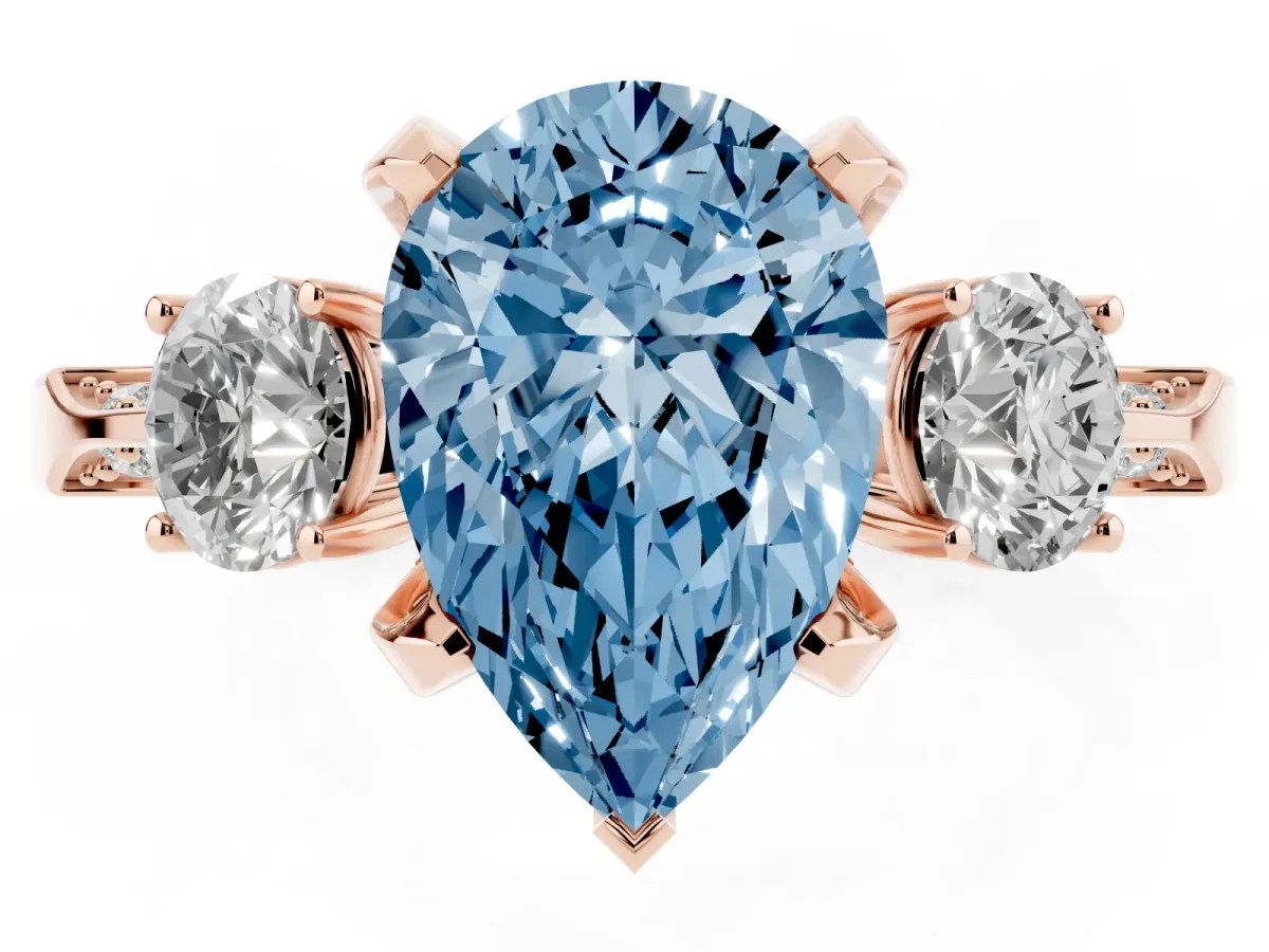 Fancy Blue Pear Cut Brilliant Three-Stone Diamond Ring with Pavé Band and Four-Prong Setting Rose gold
