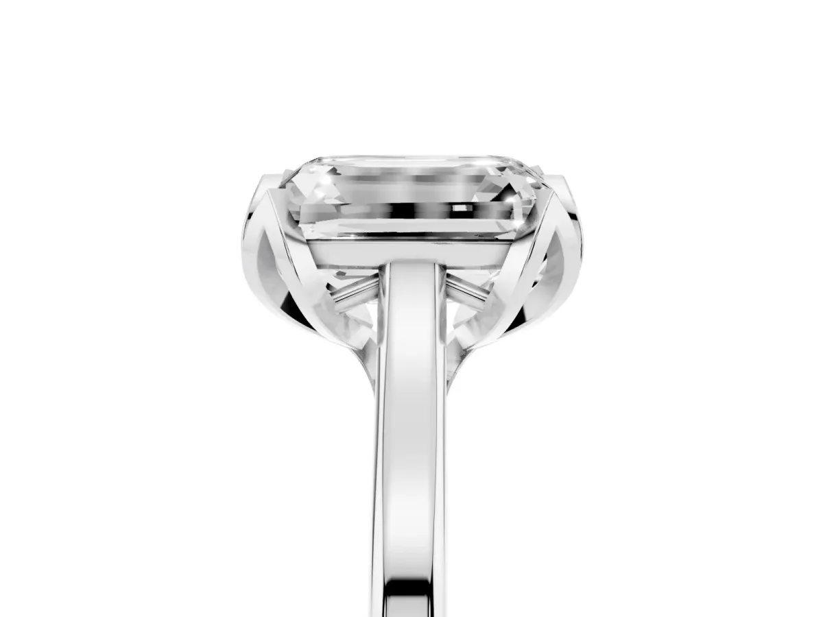 Emerald Cut Diamond Solitaire Ring with Flower Prong Setting and Classic Band Platinum