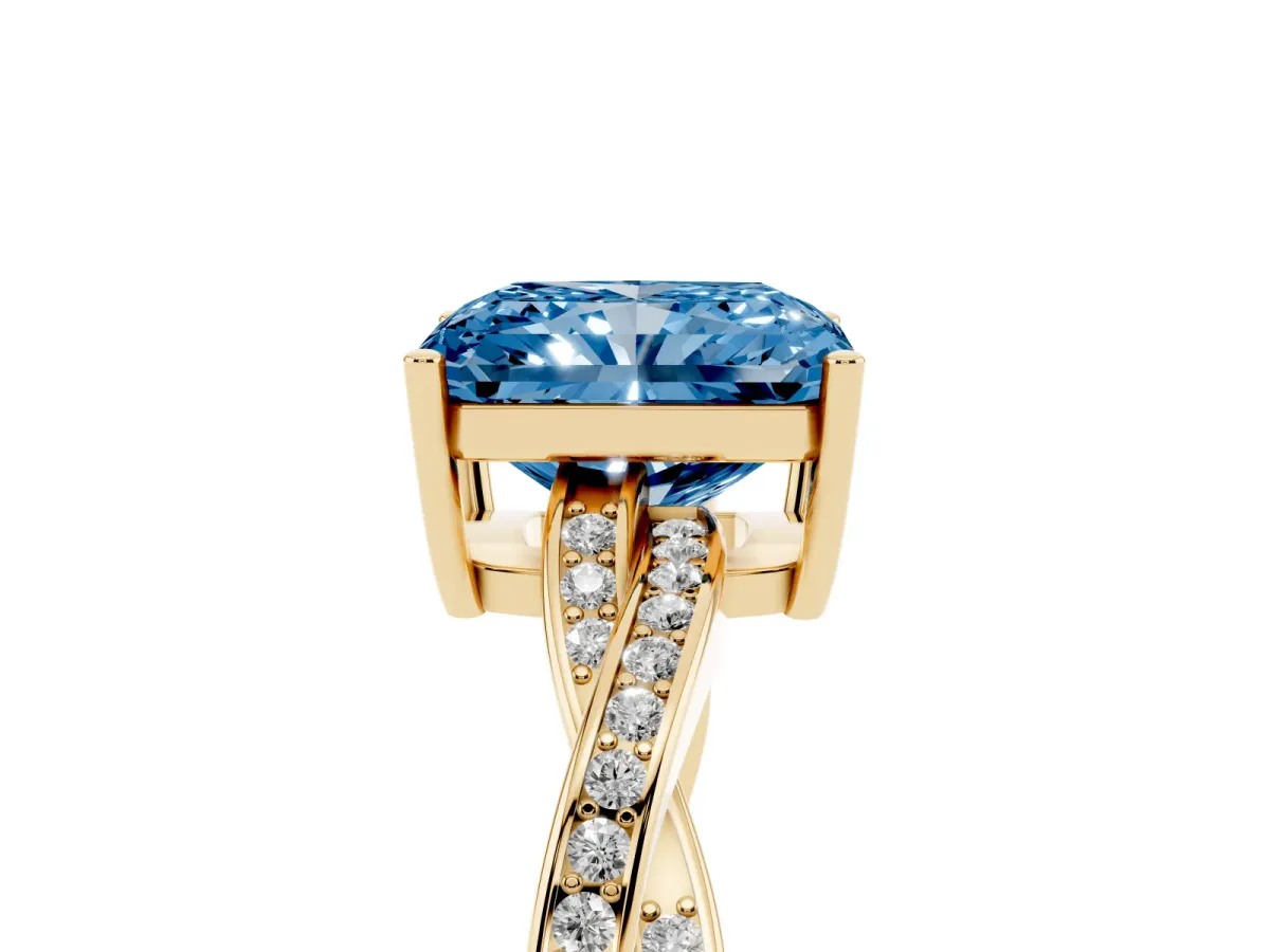 Fancy Blue Radiant Cut Solitaire Twisted Pave Diamond Ring with Four-Prong Setting Yellow gold