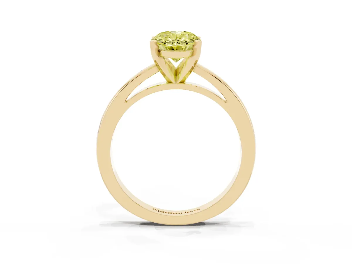Fancy Yellow Oval Cut Solitaire Diamond Engagement Ring with Four-Prong Setting on a Classic Band Yellow gold