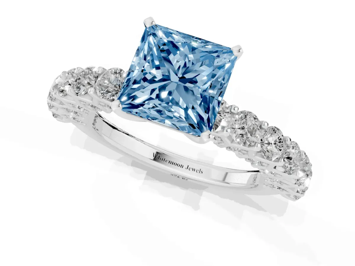 Fancy Blue Princess Cut Diamond Solitaire Ring with Shared Prong Pavé Band and Four-Prong Setting Silver