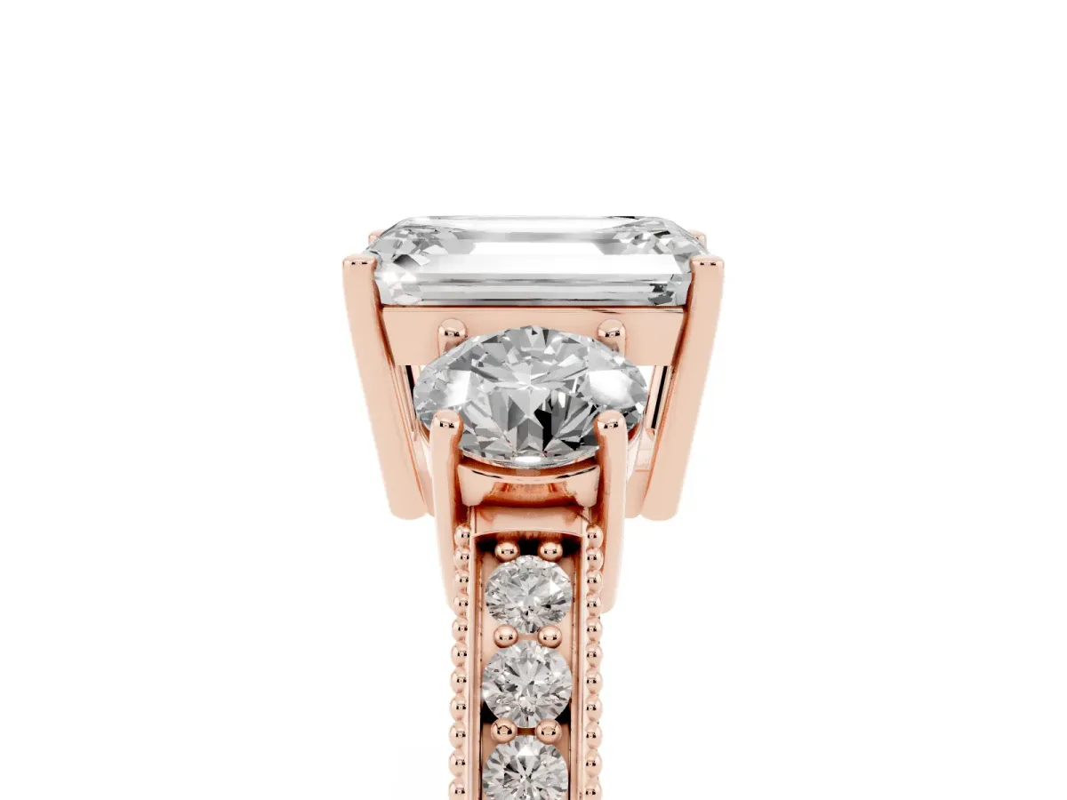Emerald Cut Three-Stone Diamond Ring with Pavé Band and Four-Prong Setting Rose gold