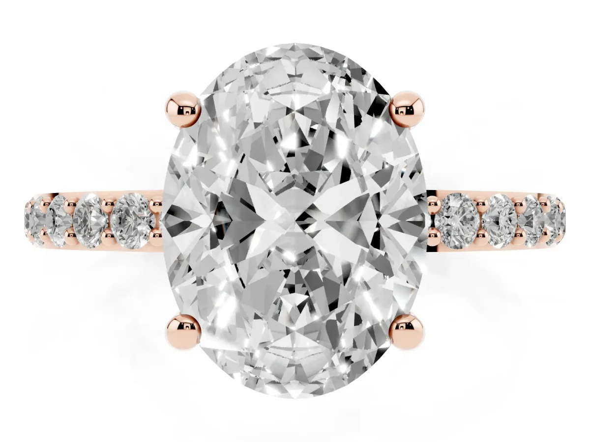 Oval Cut Diamond Solitaire Ring with Round Pavé Band and Prong Setting Rose gold