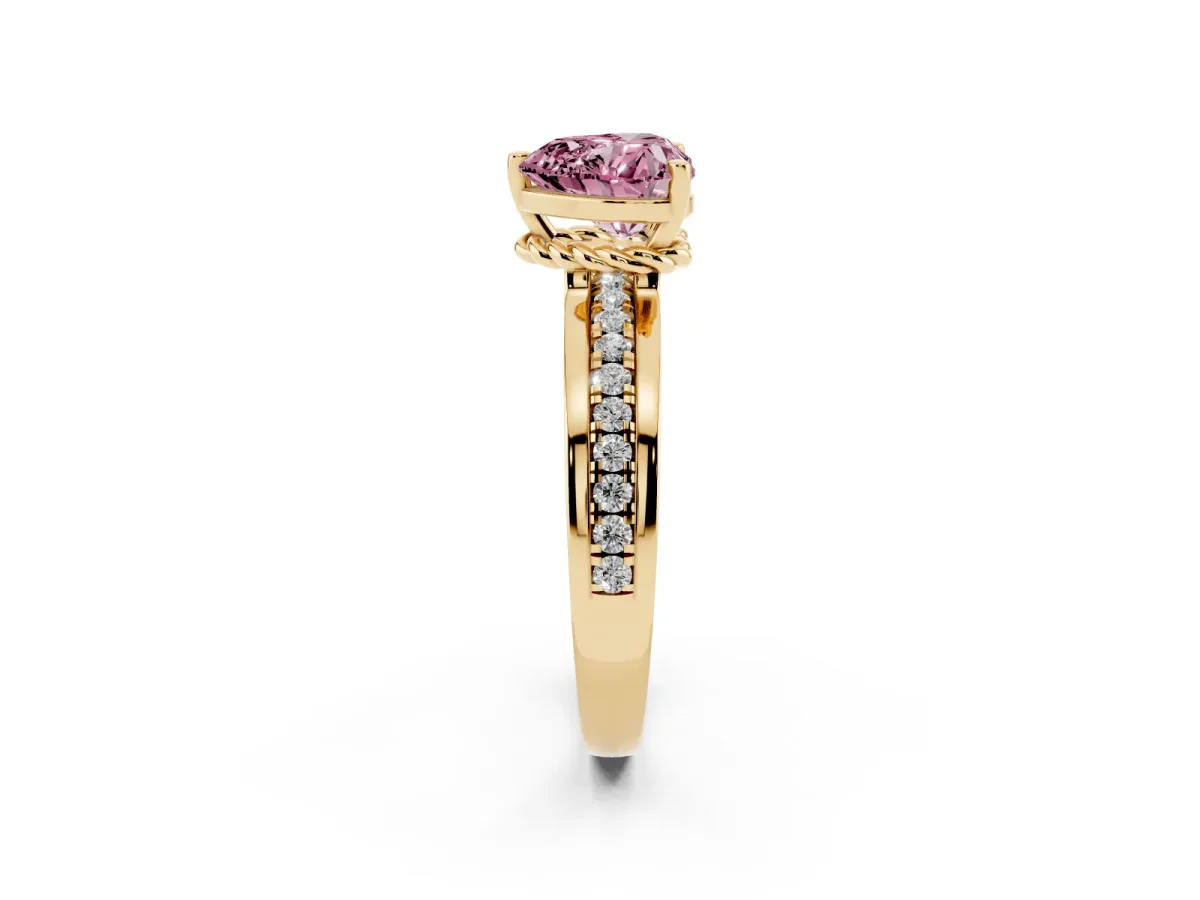 Fancy Pink Heart Cut Solitaire Diamond Ring with Channel Set Band and Six-Prong Setting Yellow gold