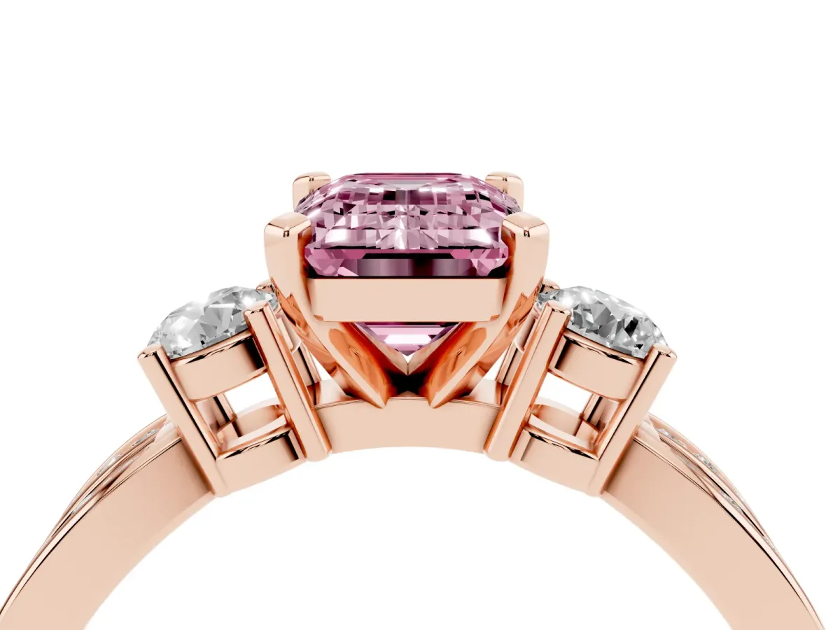 Fancy Pink Three-Stone Emerald Cut Cut Diamond Twist Band with Prong Setting Rose gold