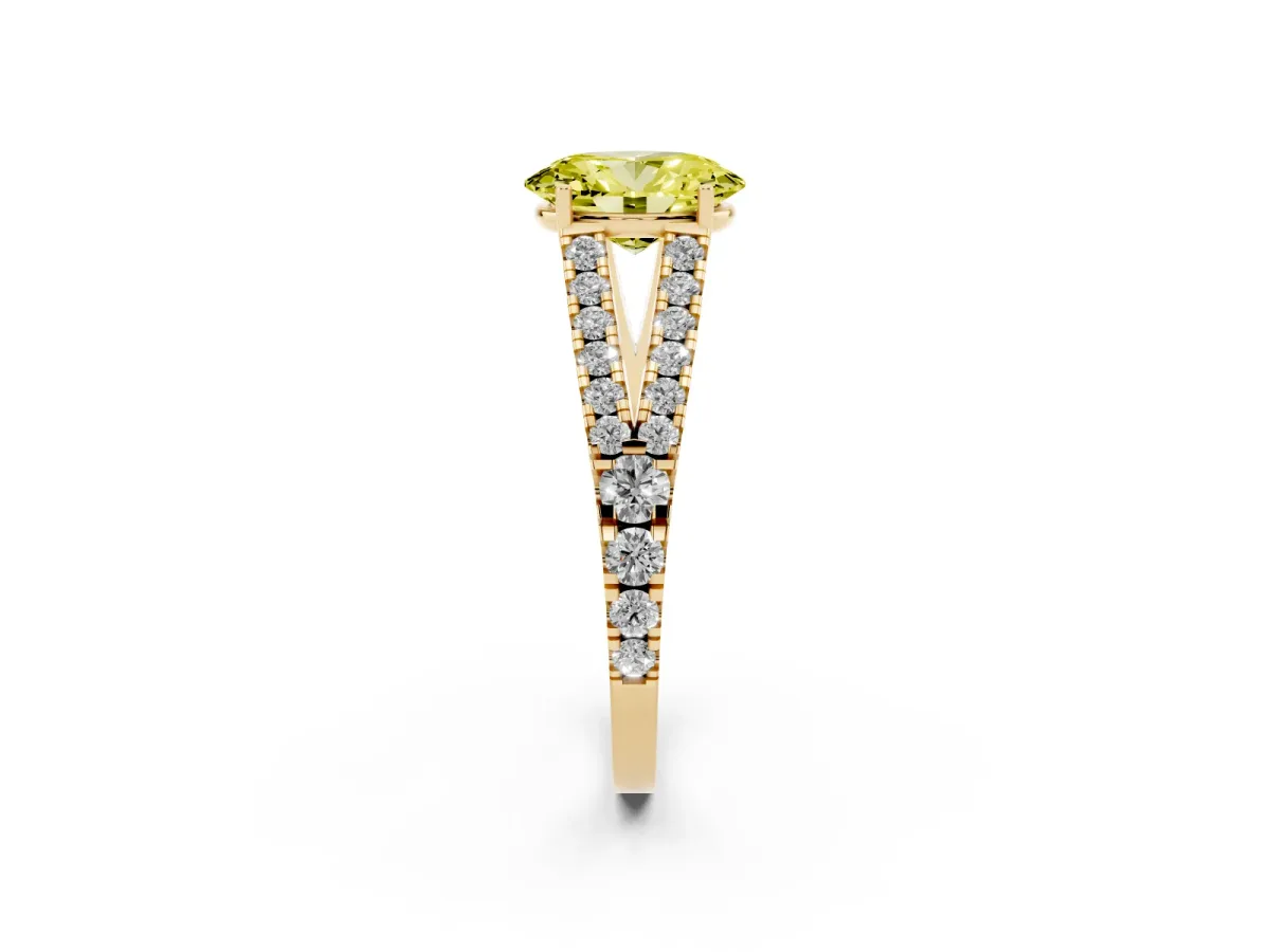 Fancy Yellow Oval Cut Diamond Split Shank Engagement Ring with Round Pavé and Prong Setting Yellow gold