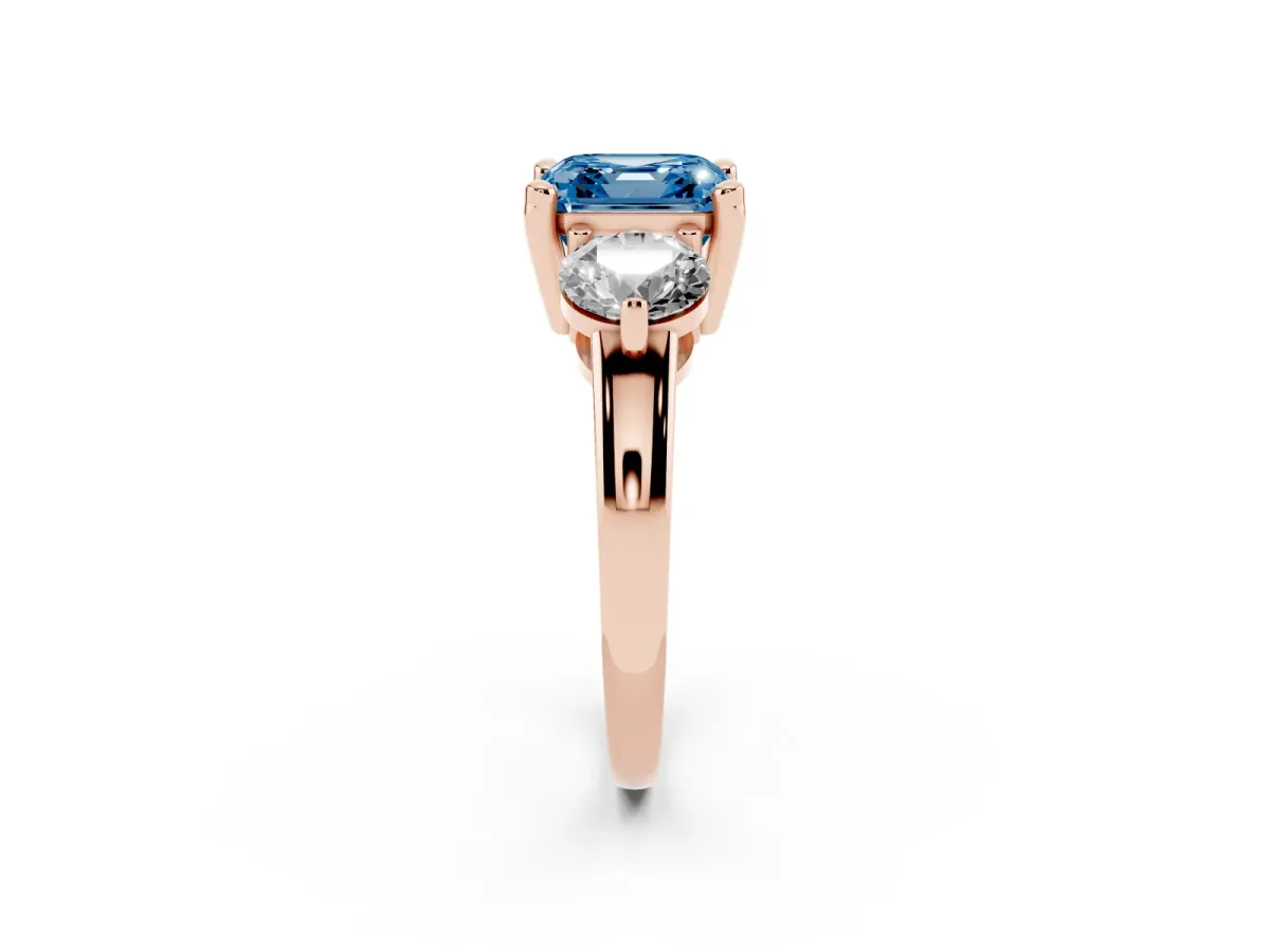 Fancy Blue Three-Stone Asscher Cut Brilliant Cut Solitaire Ring with Prong Setting on a Classic Band Rose gold