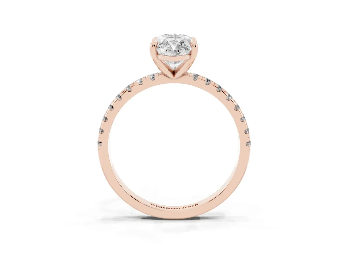 Marquise Cut Diamond Brilliant Solitaire Ring with Pavé Band and Four-Prong Setting Rose gold