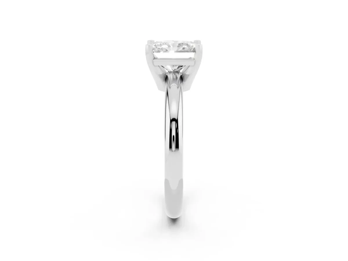 Radiant Cut Diamond Solitaire Engagement Ring with Round Band and Four-Prong Setting Silver