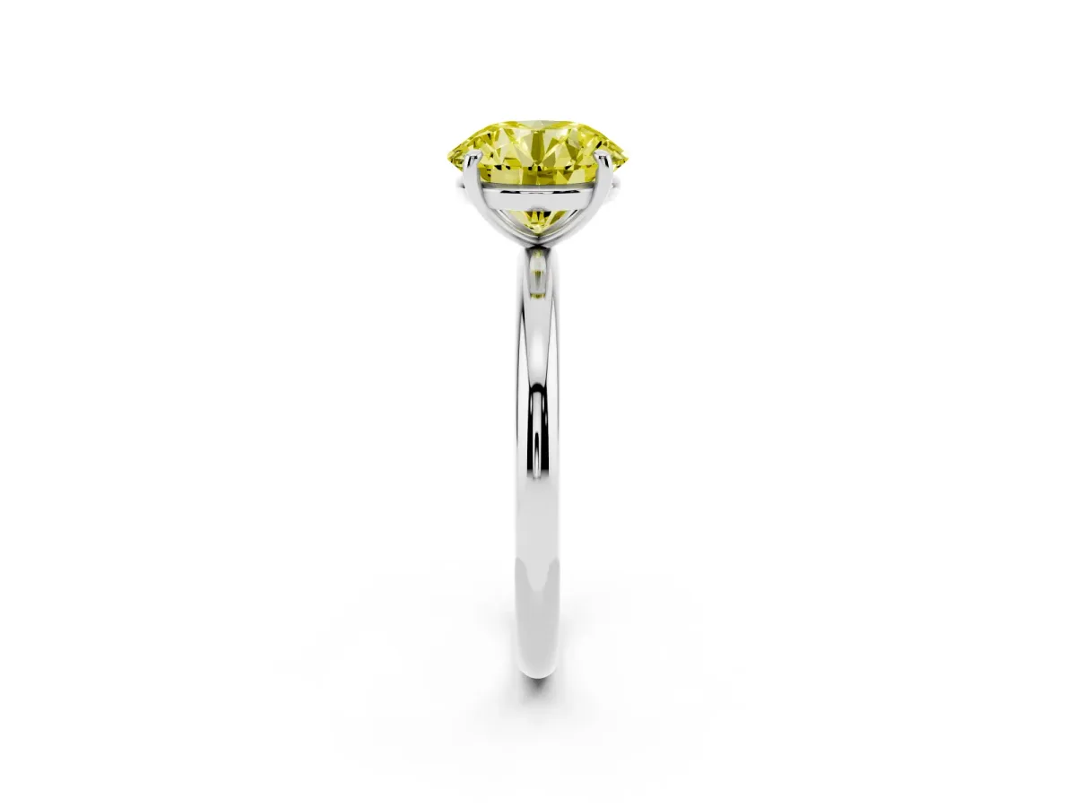 Fancy Yellow Round Cut Solitaire Diamond Ring with Four-Prong Setting on a Plain Band White gold