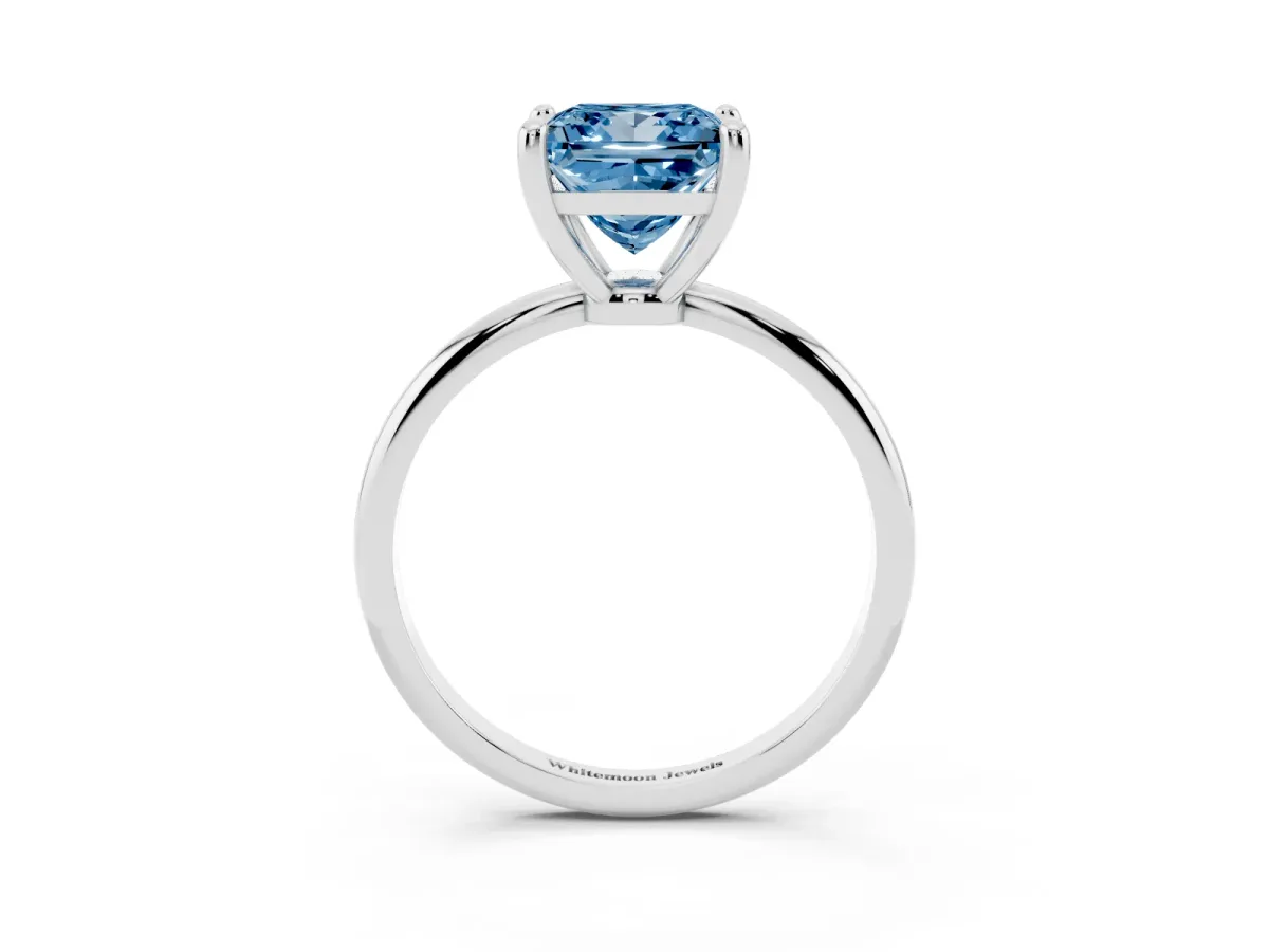 Fancy Blue Princess Cut Solitaire Diamond Ring with 4-Prong Setting on a Classic Band Silver