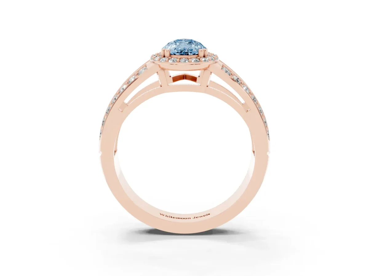 Fancy Blue Pear Cut Diamond Halo Ring with Split Shank Pavé Band and Four-Prong Setting Rose gold