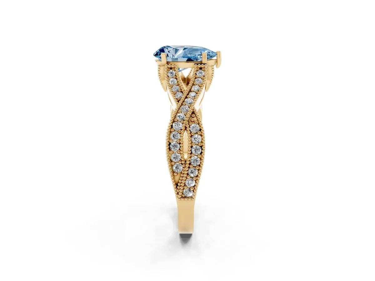 Fancy Blue Pear Cut Cut Diamond Twisted Band with Milgrain Pave Setting and Four-Prong Setting Yellow gold