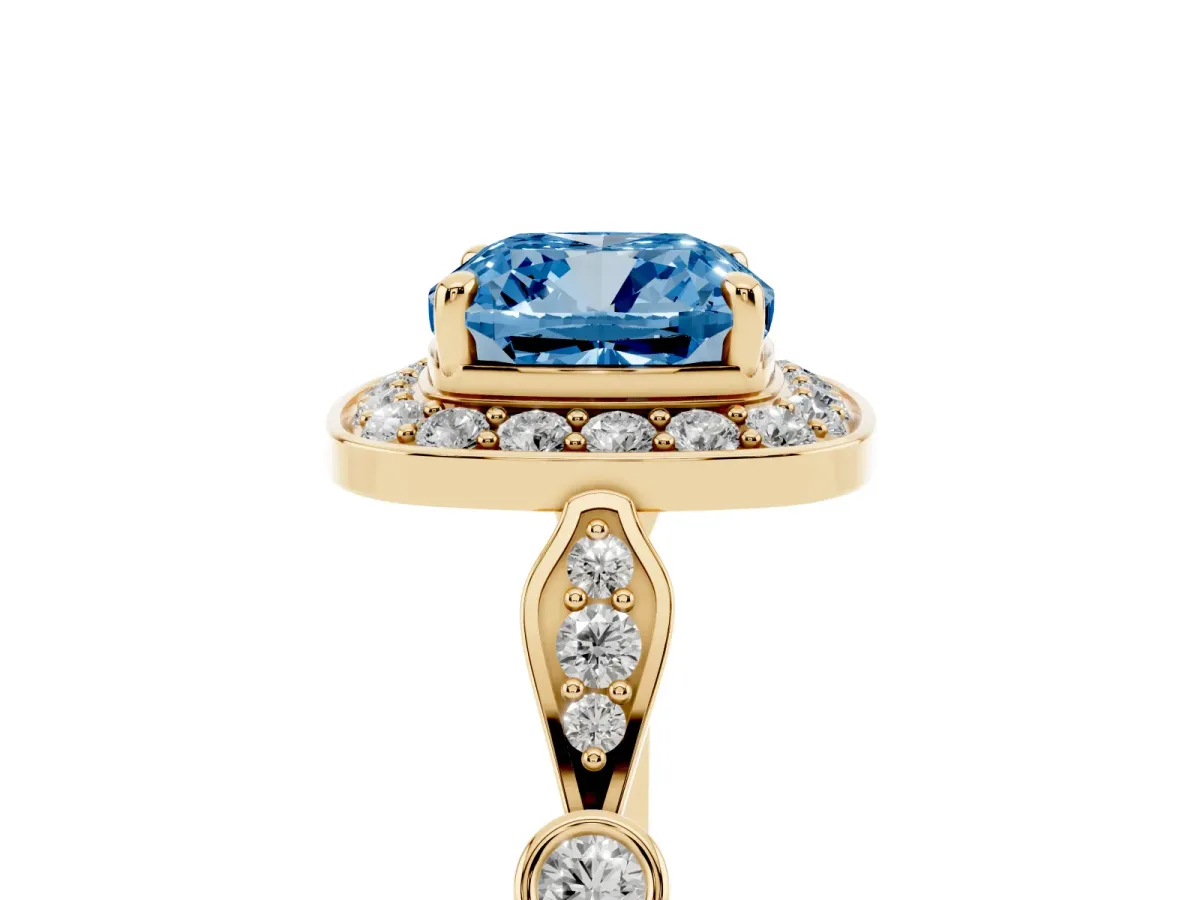 Fancy Blue Cushion Cut Halo Diamond Engagement Ring with Twisted Band and Four-Prong Setting Yellow gold
