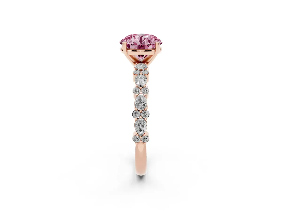 Fancy Pink Round Cut Diamond Side Stone Solitaire Ring with Round and Four-Prong Setting Rose gold