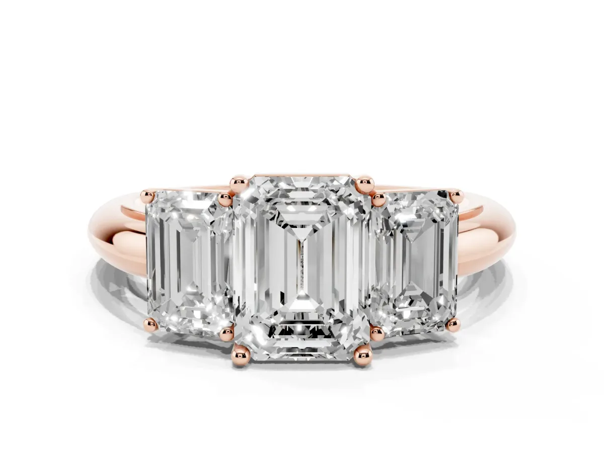 Three-Stone Emerald Cut Cut Diamond Engagement Ring with Prong Setting on a White Gold Band Rose gold