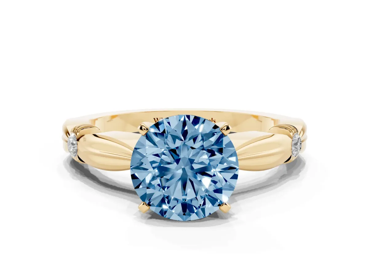 Fancy Blue Round Cut Solitaire Diamond Twisted Band with Four-Prong Setting Yellow gold