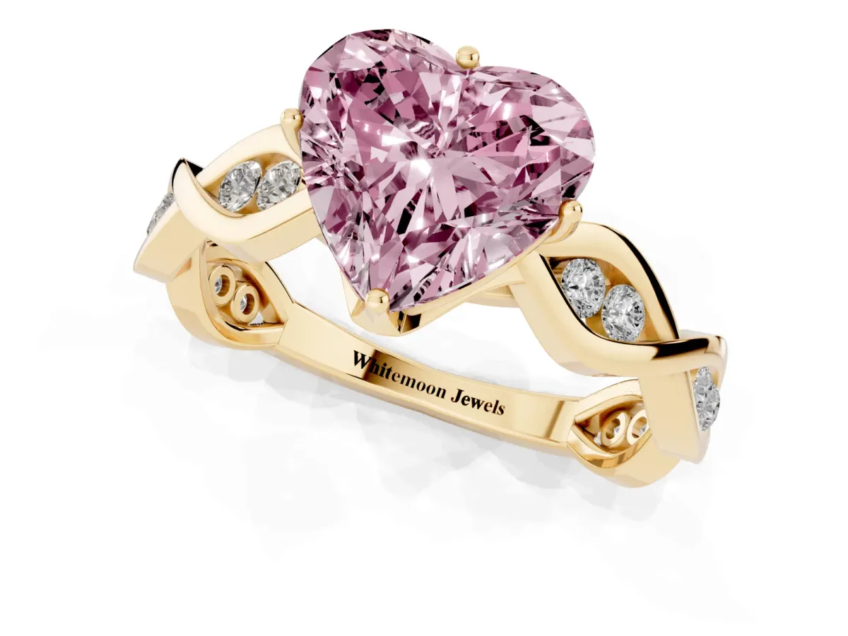 Fancy Pink Heart Cut Solitaire Twist Band with Leaf Prong Setting Yellow gold