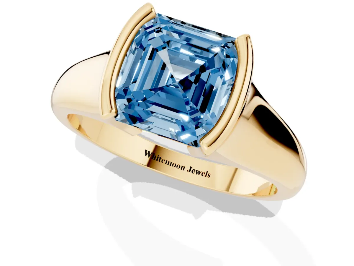 Fancy Blue Asscher Cut Solitaire Tension Set Diamond Ring with Split Shank Band Yellow gold