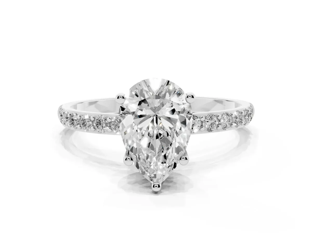 Pear Cut Diamond Solitaire Ring with Round Pavé Shoulders and Prong Setting Platinum