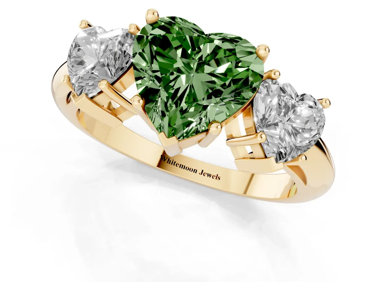Fancy Green Three-Stone Heart Cut Cut Diamond Engagement Ring with Prong Setting on a White Gold Band Yellow gold