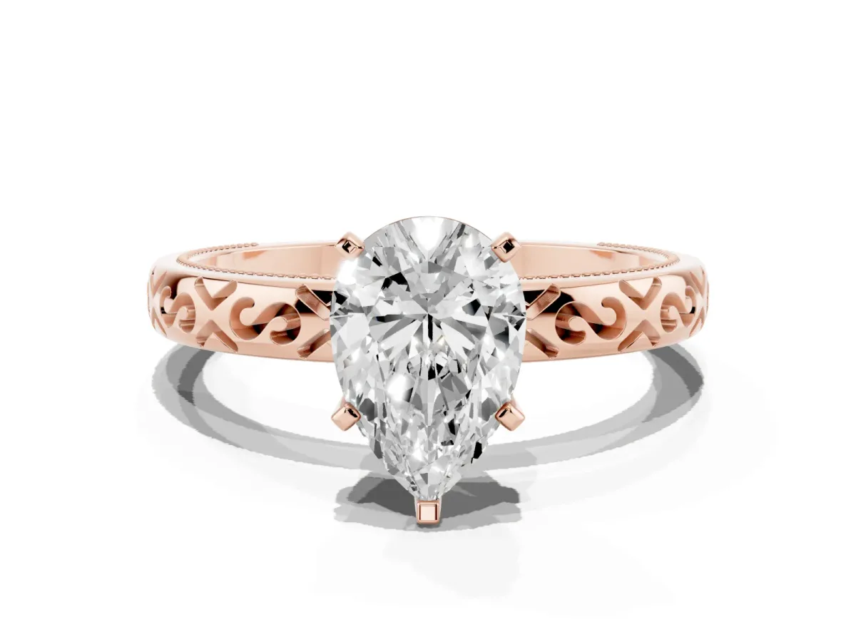 Pear Cut Solitaire Engagement Ring with Scrollwork Band and Four-Prong Setting Rose gold