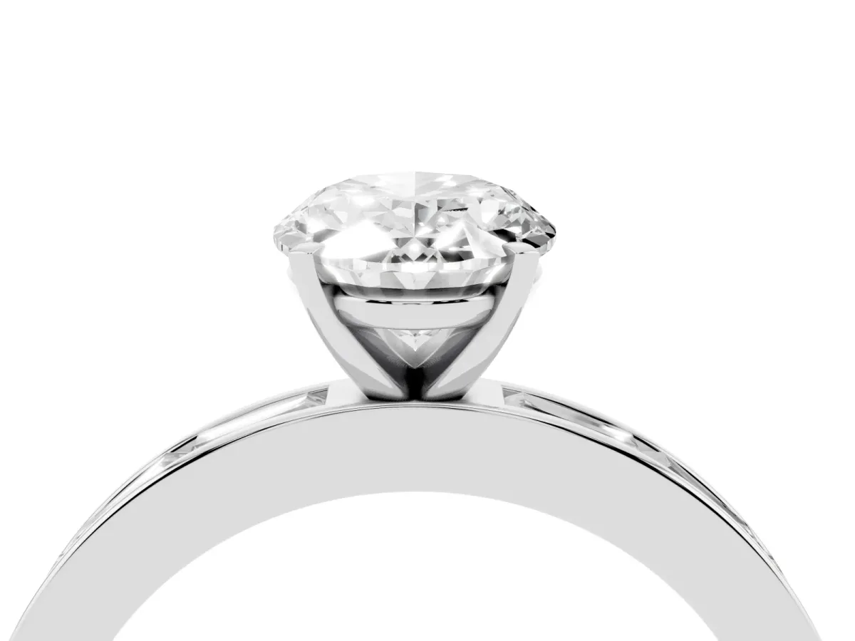 Oval Cut Solitaire Diamond Ring with Channel-Set Baguette Band and Four-Prong Setting White gold