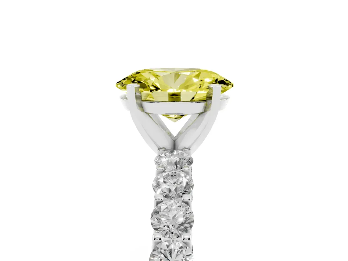 Fancy Yellow Oval Cut Diamond Solitaire Ring with Shared Prong Pavé Band and Four-Prong Setting Silver