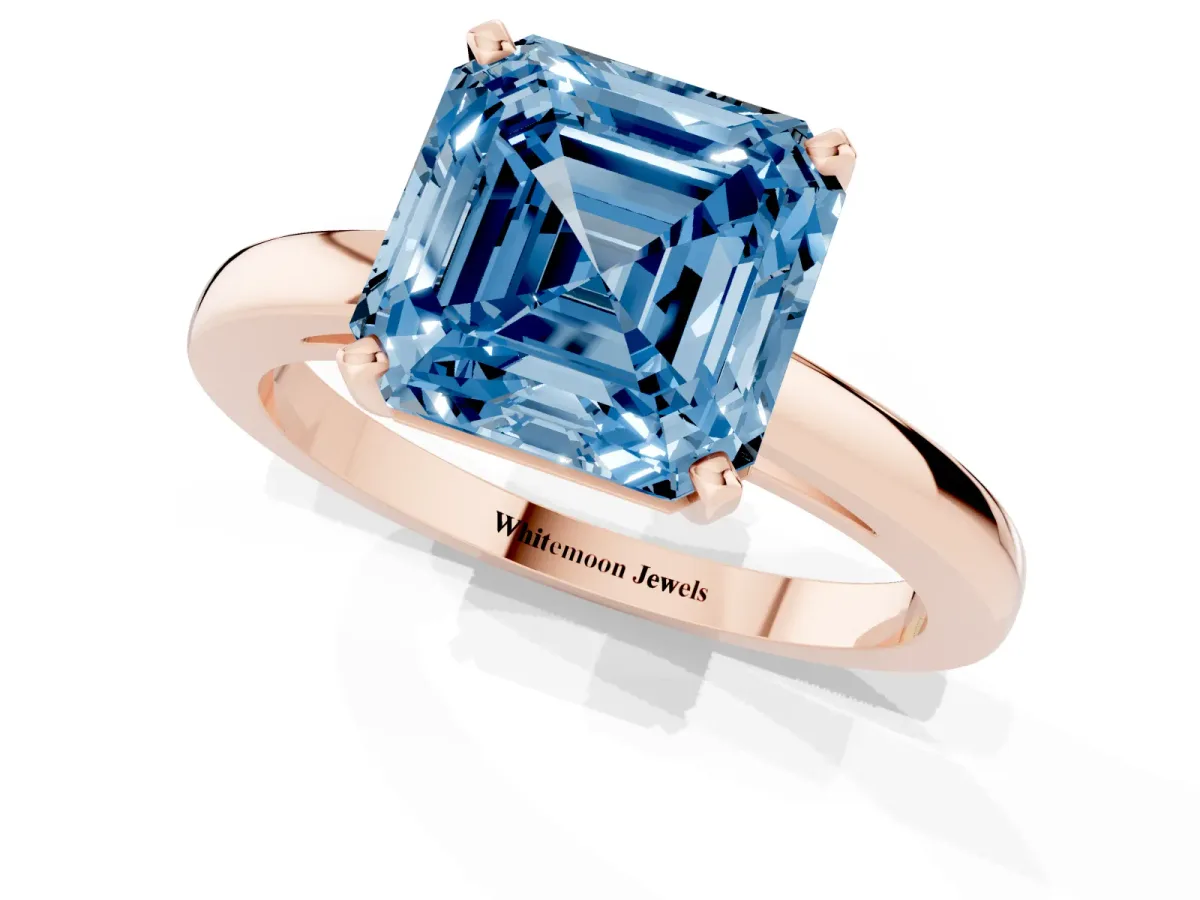 Fancy Blue Asscher Cut Solitaire Diamond Engagement Ring with Four-Prong Setting on a Classic Band Rose gold