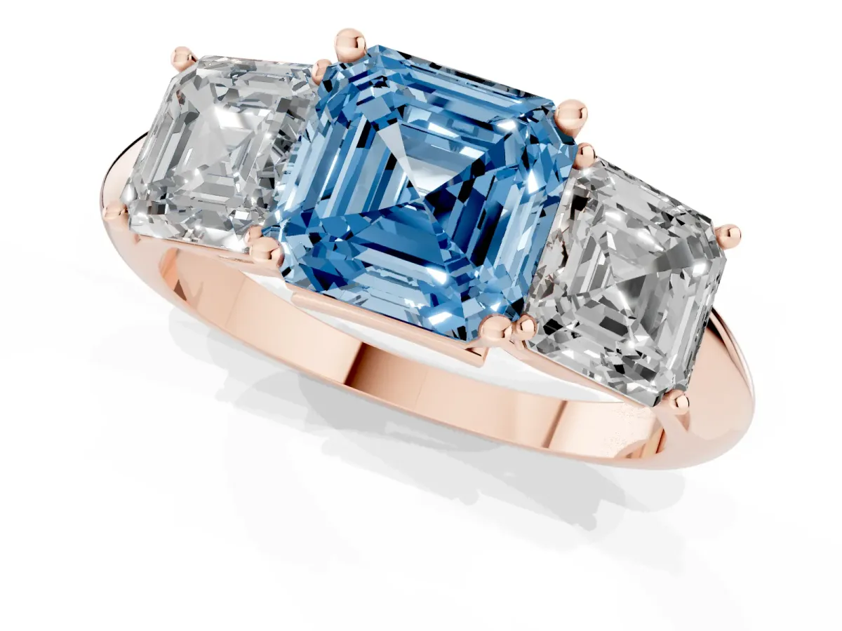 Fancy Blue Three-Stone Asscher Cut Cut Diamond Engagement Ring with Prong Setting on a White Gold Band Rose gold