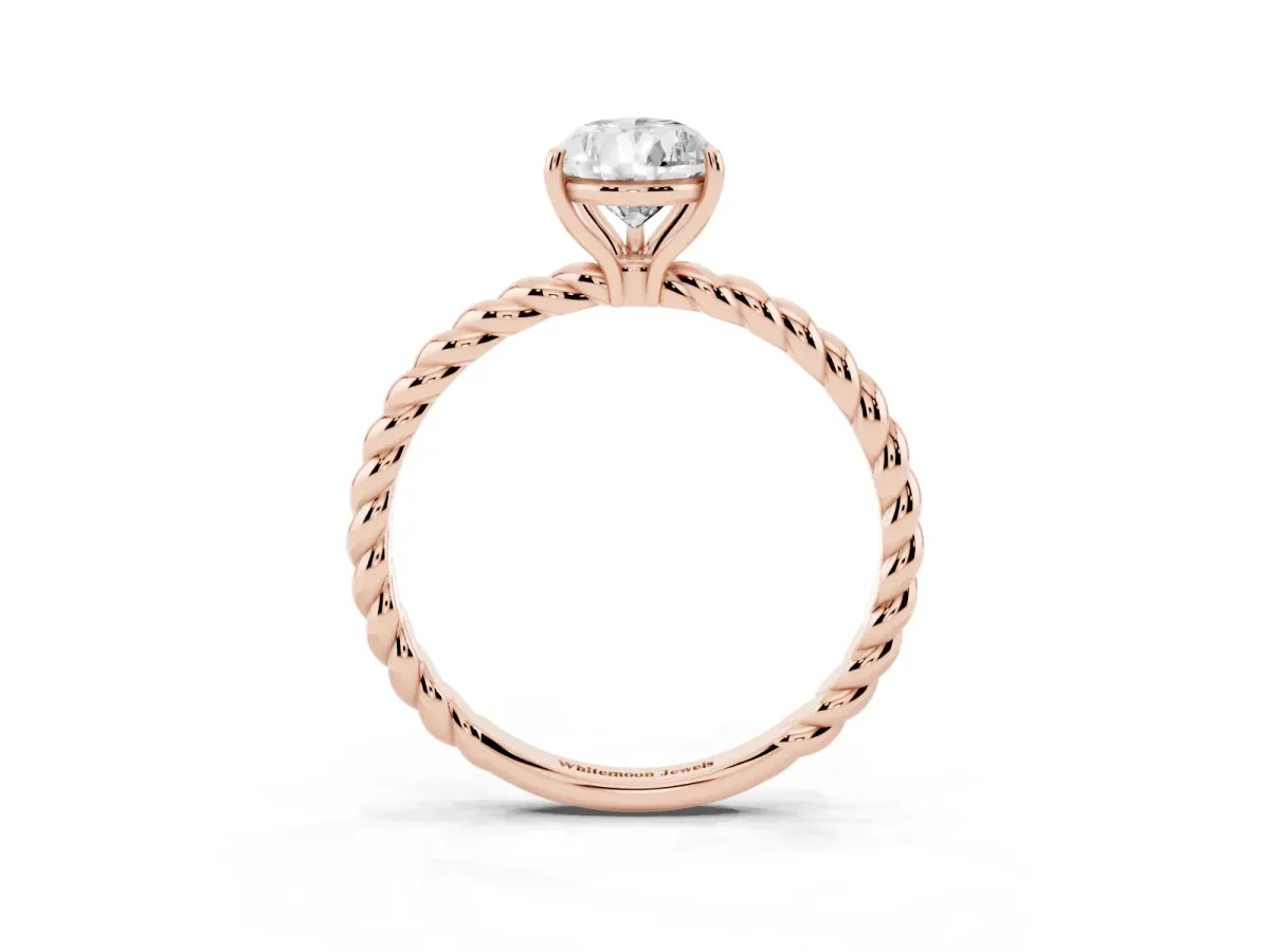 Pear Cut Solitaire Twist Band Ring with Four-Prong Setting Rose gold