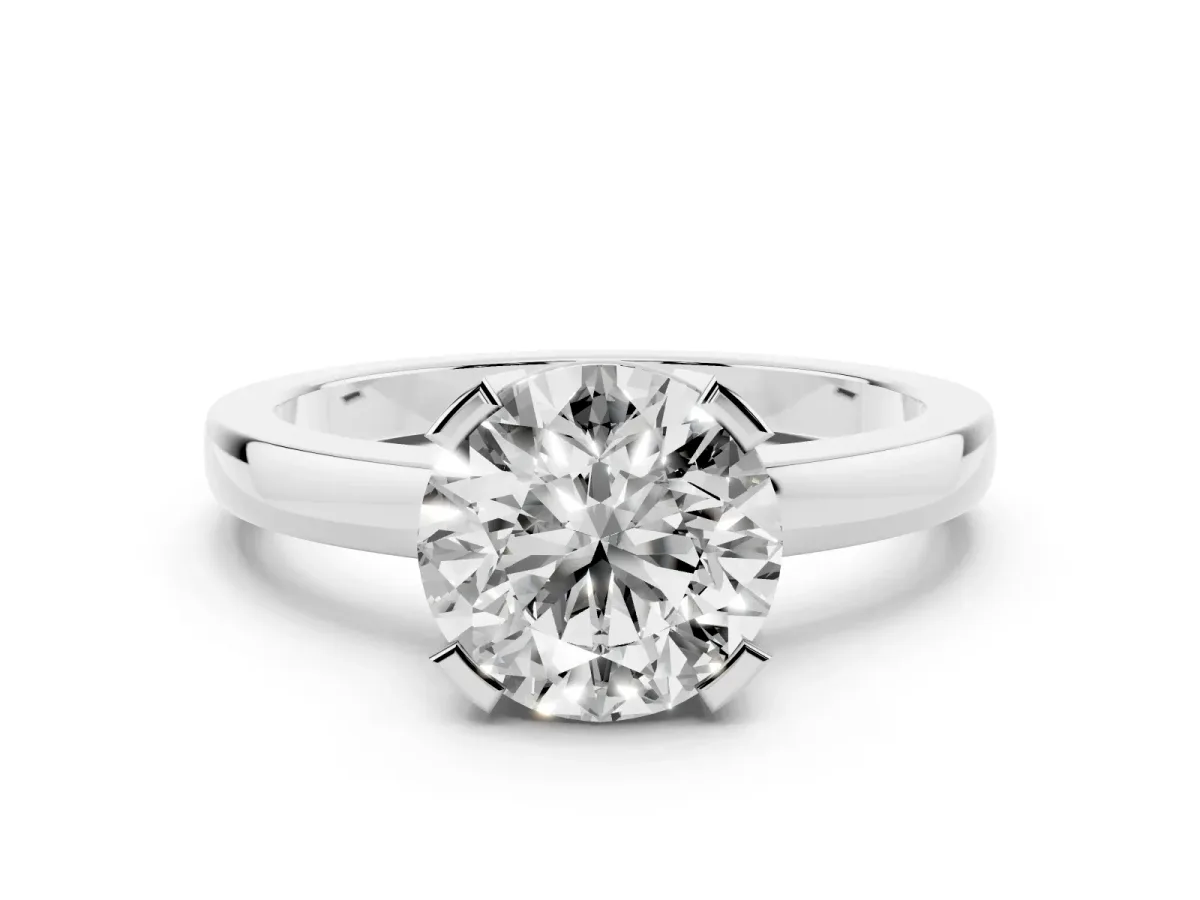Round Cut Cut Solitaire Ring with Four-Prong Setting and Classic Band Silver