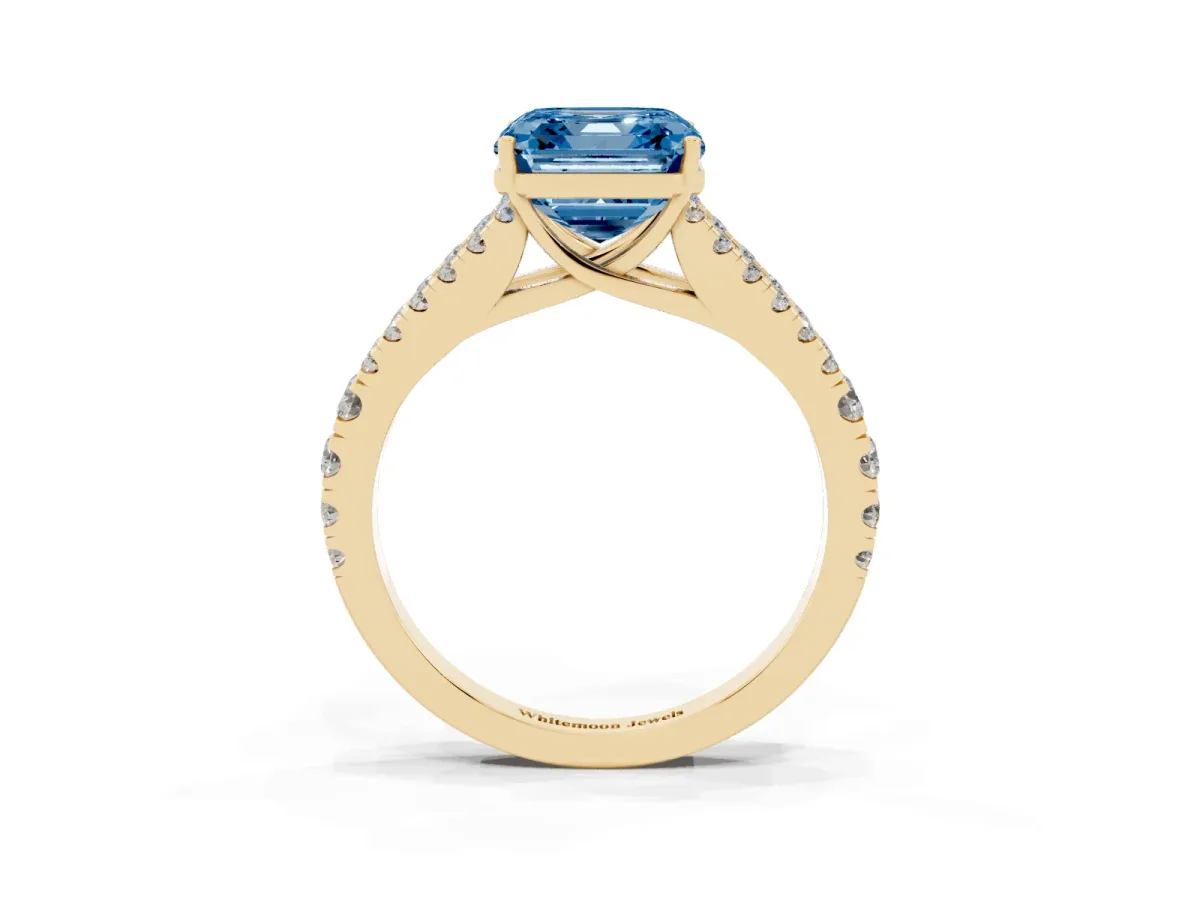 Fancy Blue Asscher Cut Diamond Split Shank Engagement Ring with Round Pavé and Prong Setting Yellow gold