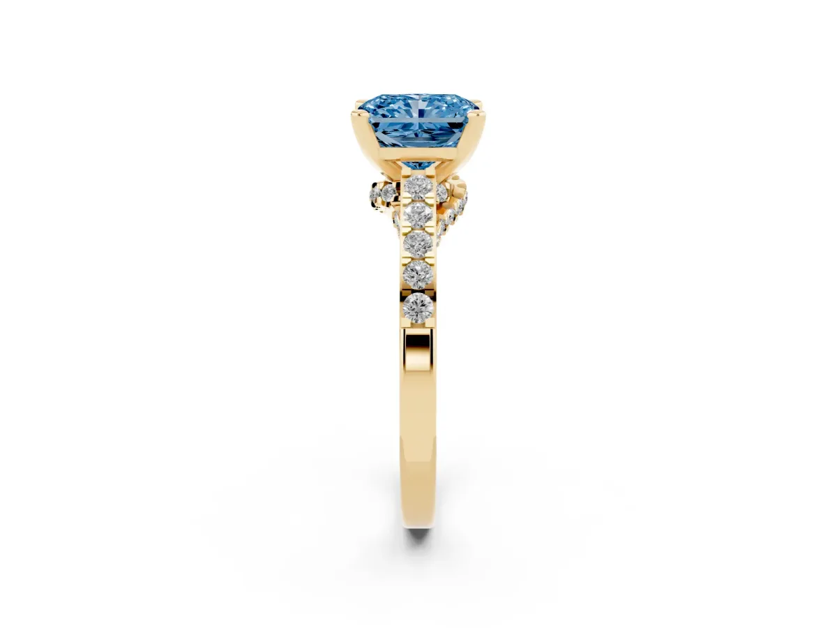 Fancy Blue Radiant Cut Diamond Solitaire Ring with Crossover Gallery and Round Pavé Band Yellow gold