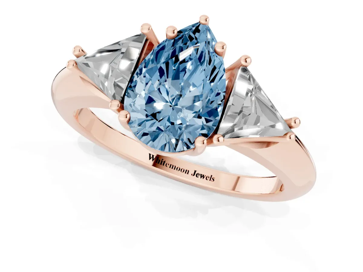 Fancy Blue Three-Stone Pear Cut Diamond Engagement Ring with Trillion Side Stones and Prong Setting Rose gold