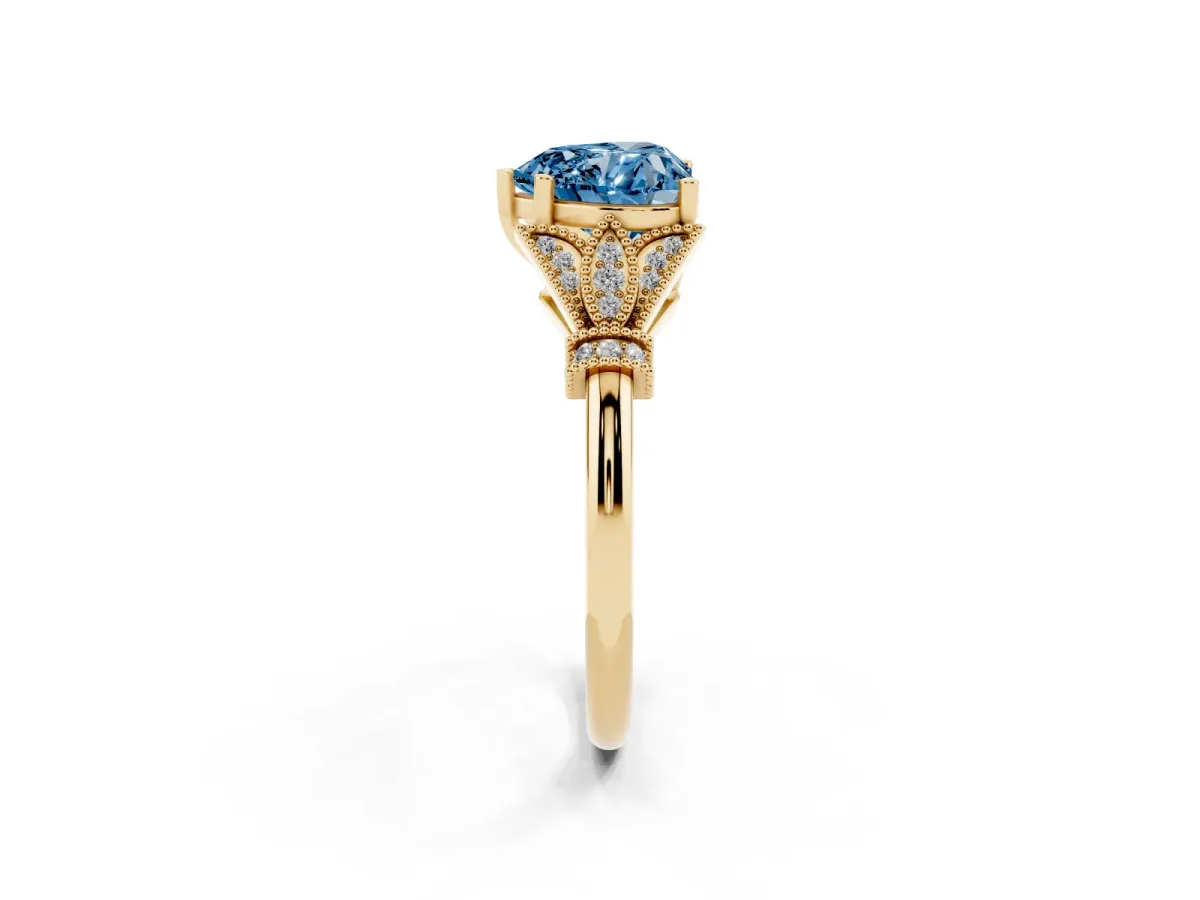 Fancy Blue Heart Cut Diamond Solitaire Ring with Floral Filigree and Pave Accents Yellow gold