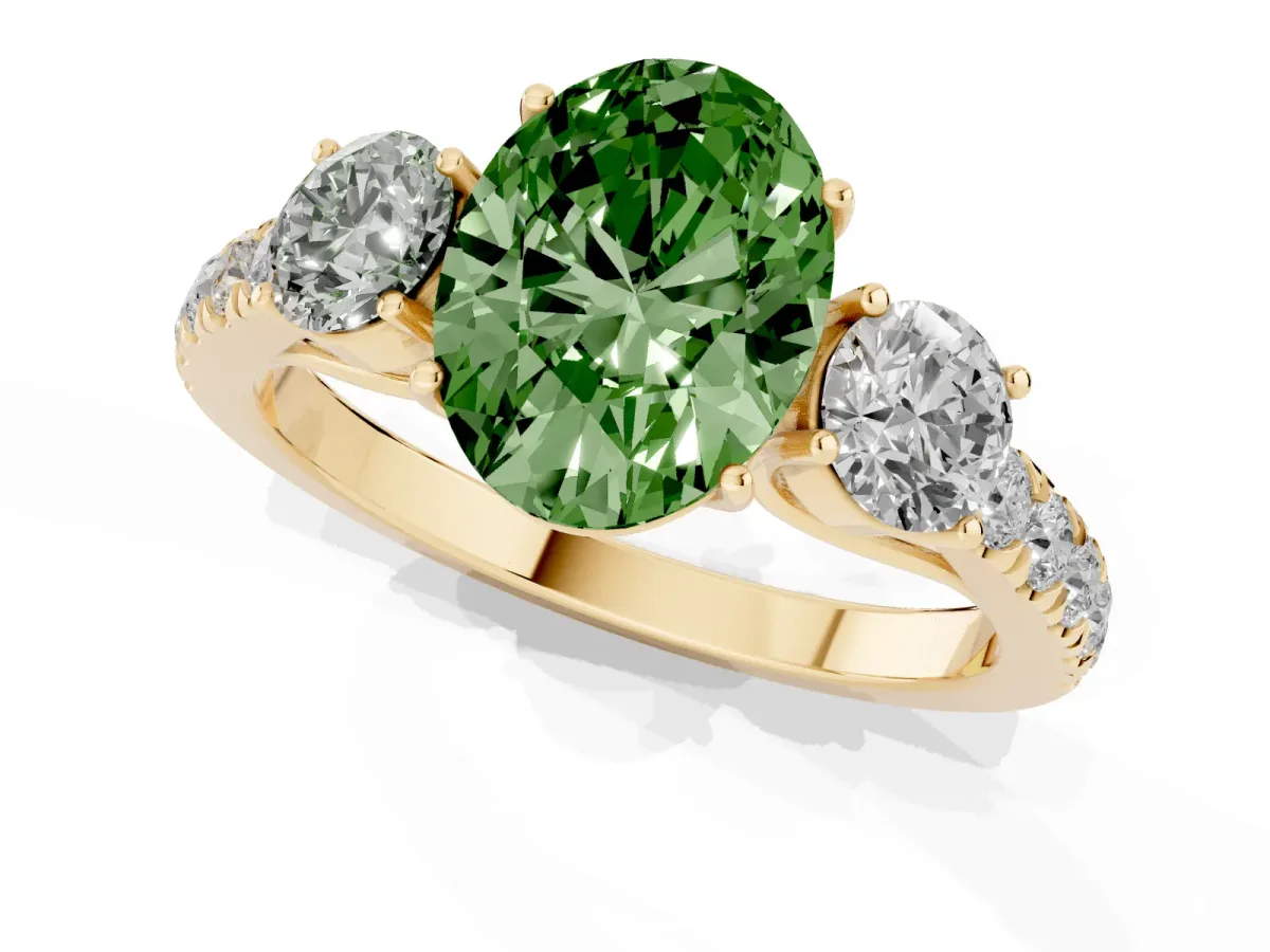 Fancy Green Oval Cut Cut Diamond Three-Stone Ring with Round Side Stones and Pavé Band Yellow gold