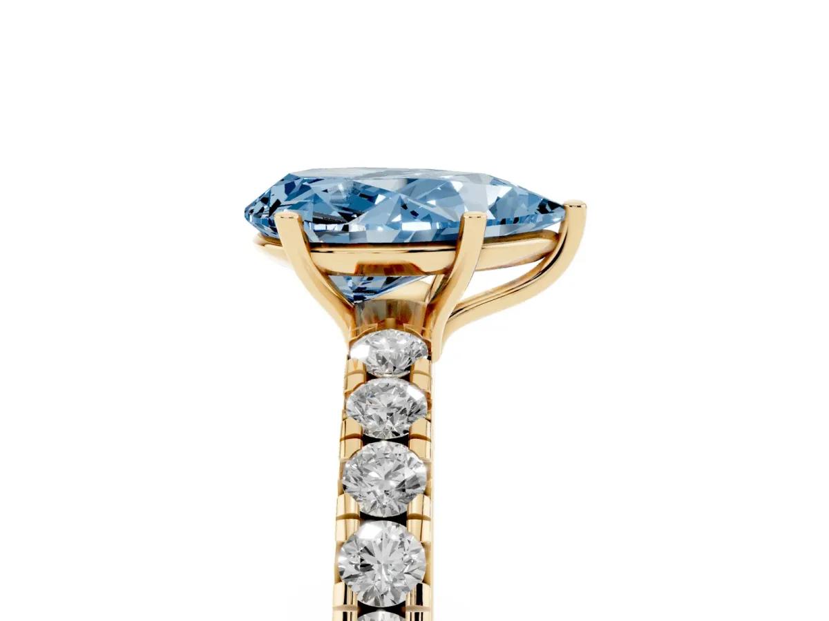 Fancy Blue Pear Cut Diamond Pavé Solitaire Engagement Ring with Four-Prong Setting Yellow gold