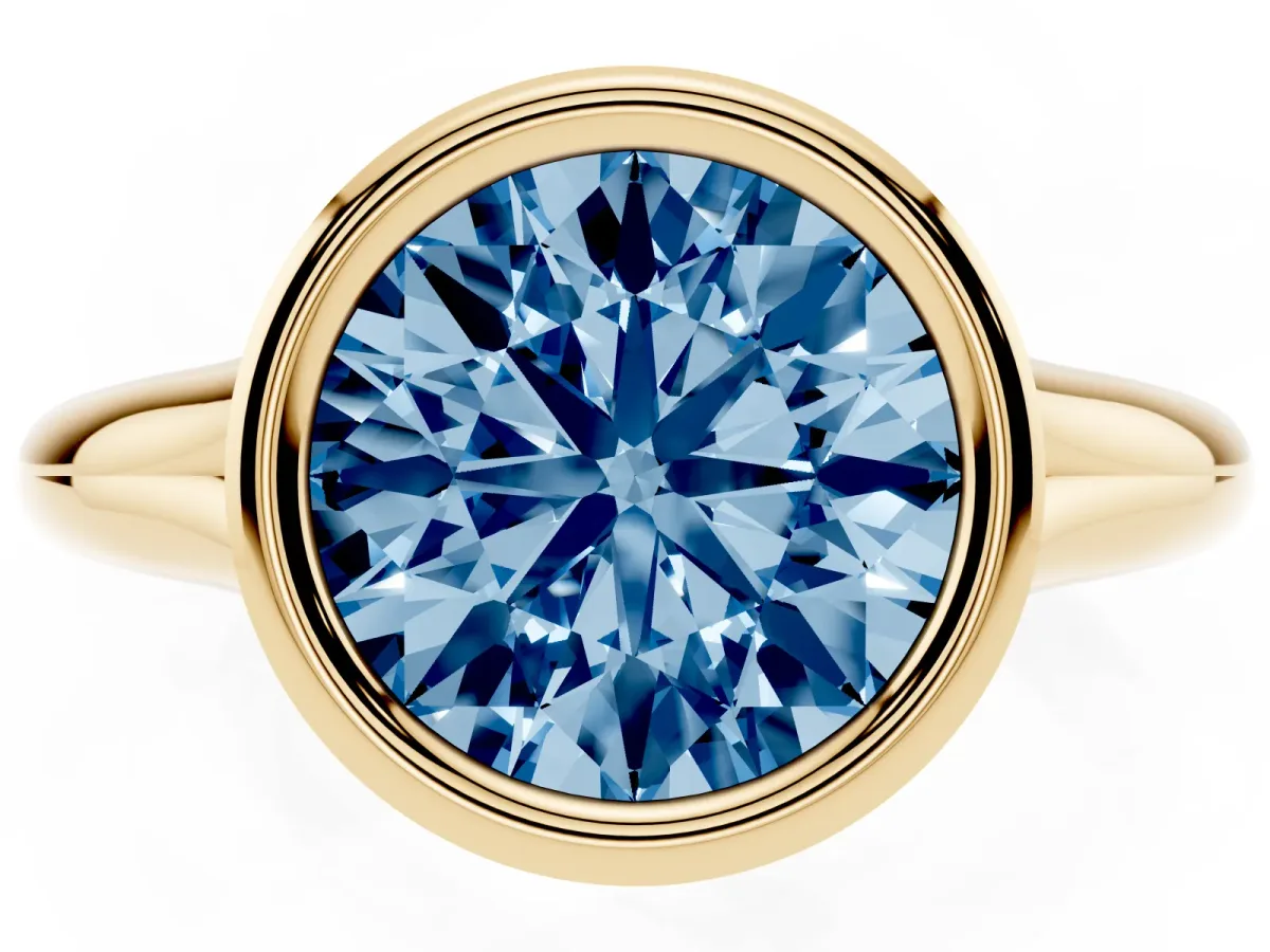 Fancy Blue Bezel Set Round Cut Solitaire Diamond Ring with Smooth Band Yellow gold