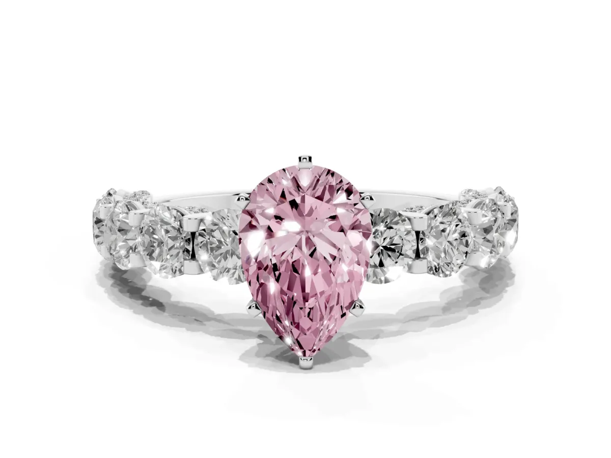 Fancy Pink Pear Cut Diamond Side Stone Engagement Ring with Four-Prong Setting Platinum