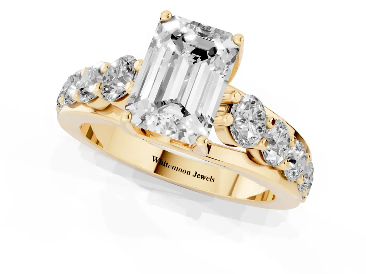 Emerald Cut Diamond Engagement Ring with Pavé Band and Four-Prong Setting Yellow gold