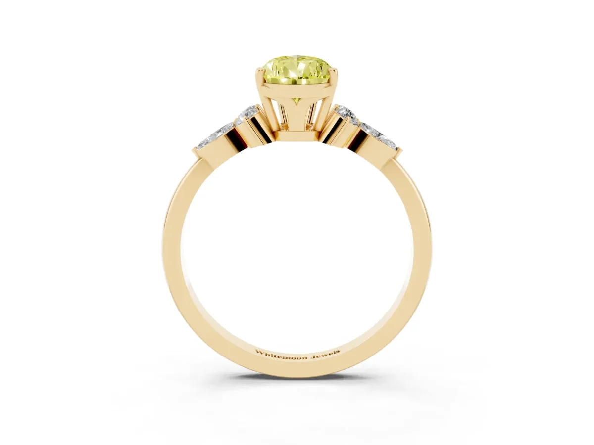 Fancy Yellow Pear Cut Brilliant Diamond Solitaire Ring with Pear Side Stones and Four-Prong Setting Yellow gold