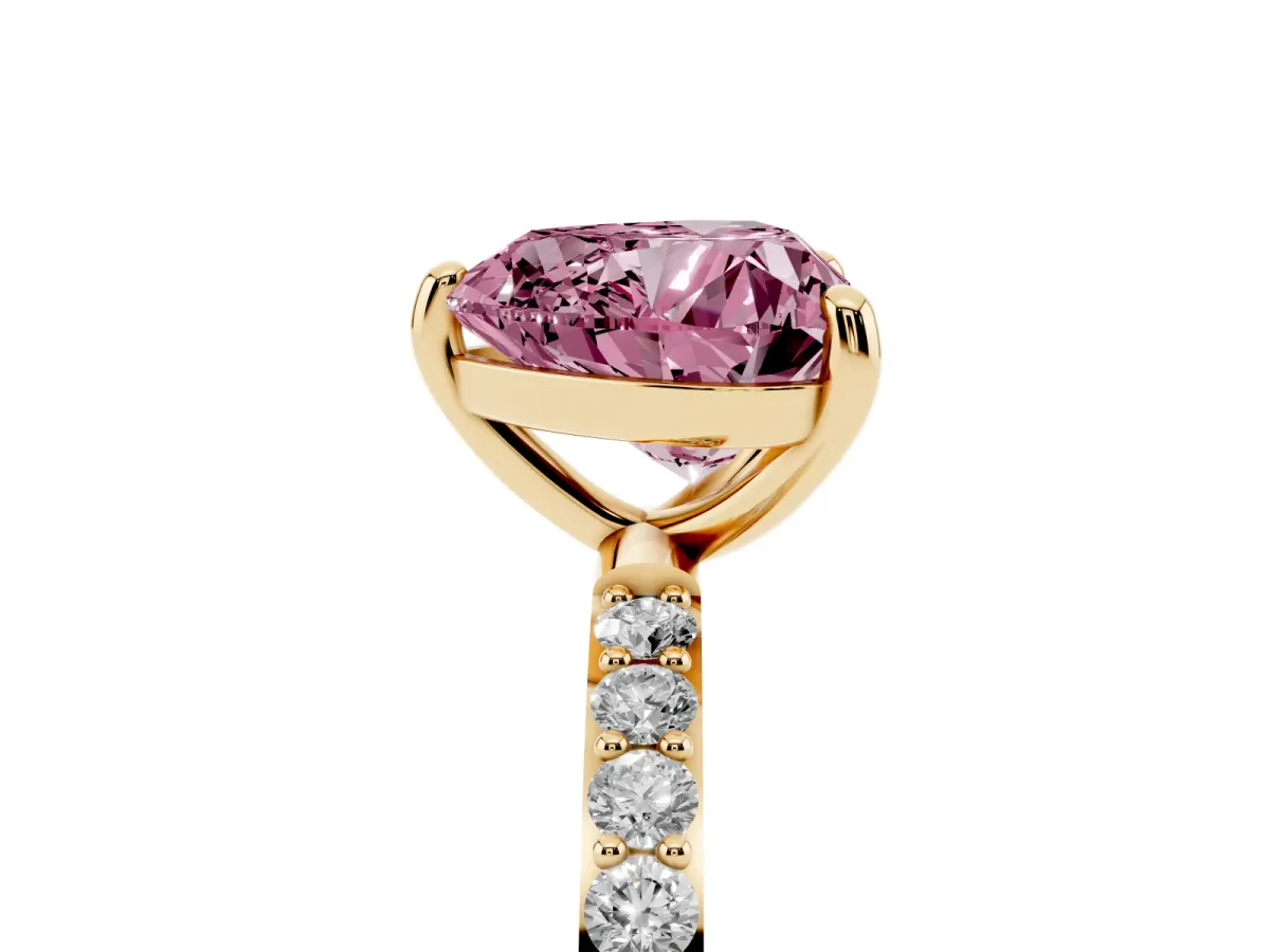 Fancy Pink Heart Cut Diamond Solitaire Ring with Round Pavé Band and Prong Setting Yellow gold