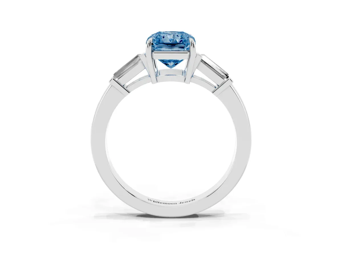 Fancy Blue Radiant Cut Diamond Three-Stone Ring with Tapered Baguette Side Stones and Prong Setting White gold
