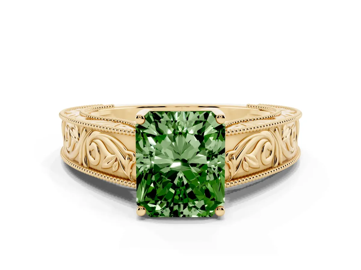 Fancy Green Radiant Cut Diamond Solitaire Ring with Engraved Band and Four-Prong Setting Yellow gold