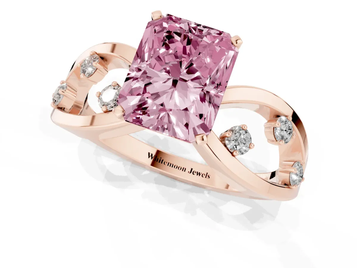 Fancy Pink Radiant Cut Cut Solitaire Diamond with Side Stones on Criss-Cross Band and Four-Prong Setting Rose gold