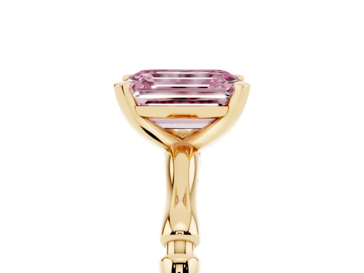 Fancy Pink Emerald Cut Solitaire Diamond Ring with Bamboo Band and Four-Prong Setting Yellow gold