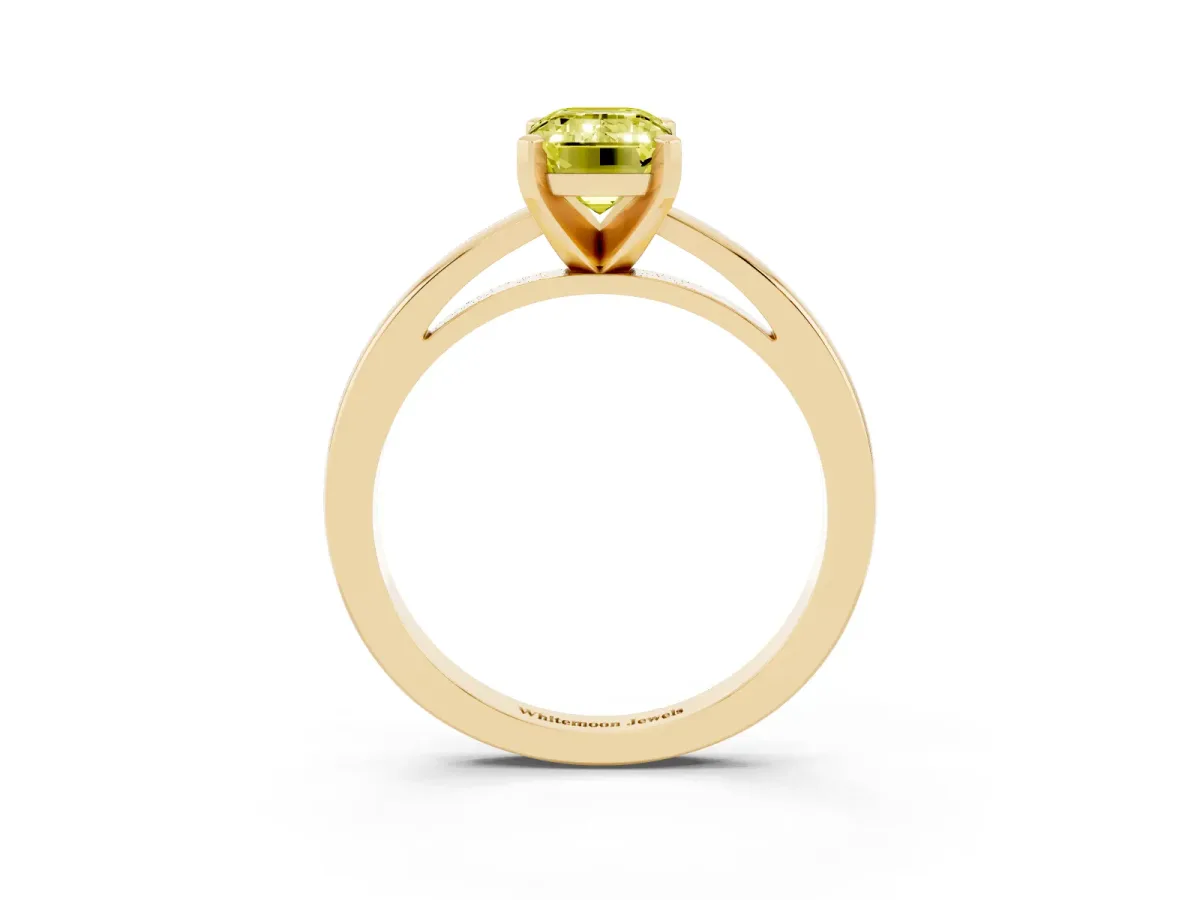 Fancy Yellow Emerald Cut Solitaire Diamond Engagement Ring with Four-Prong Setting on a Classic Band Yellow gold