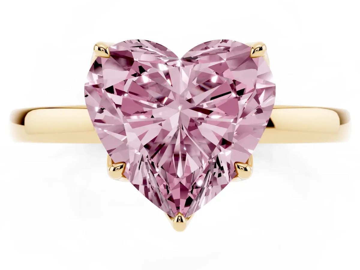 Fancy Pink Heart Cut Diamond Solitaire Ring with Thin Band and Prong Setting Yellow gold