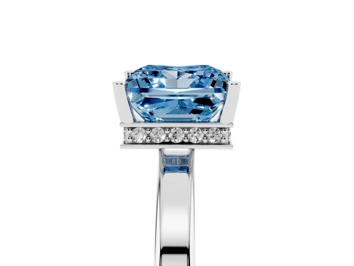 Fancy Blue Princess Cut Cut Solitaire Engagement Ring with Four-Prong Setting on a Classic Band Silver